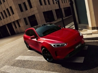 Red SUV on a city street
