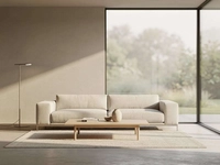 Living room with a cream sofa in window light