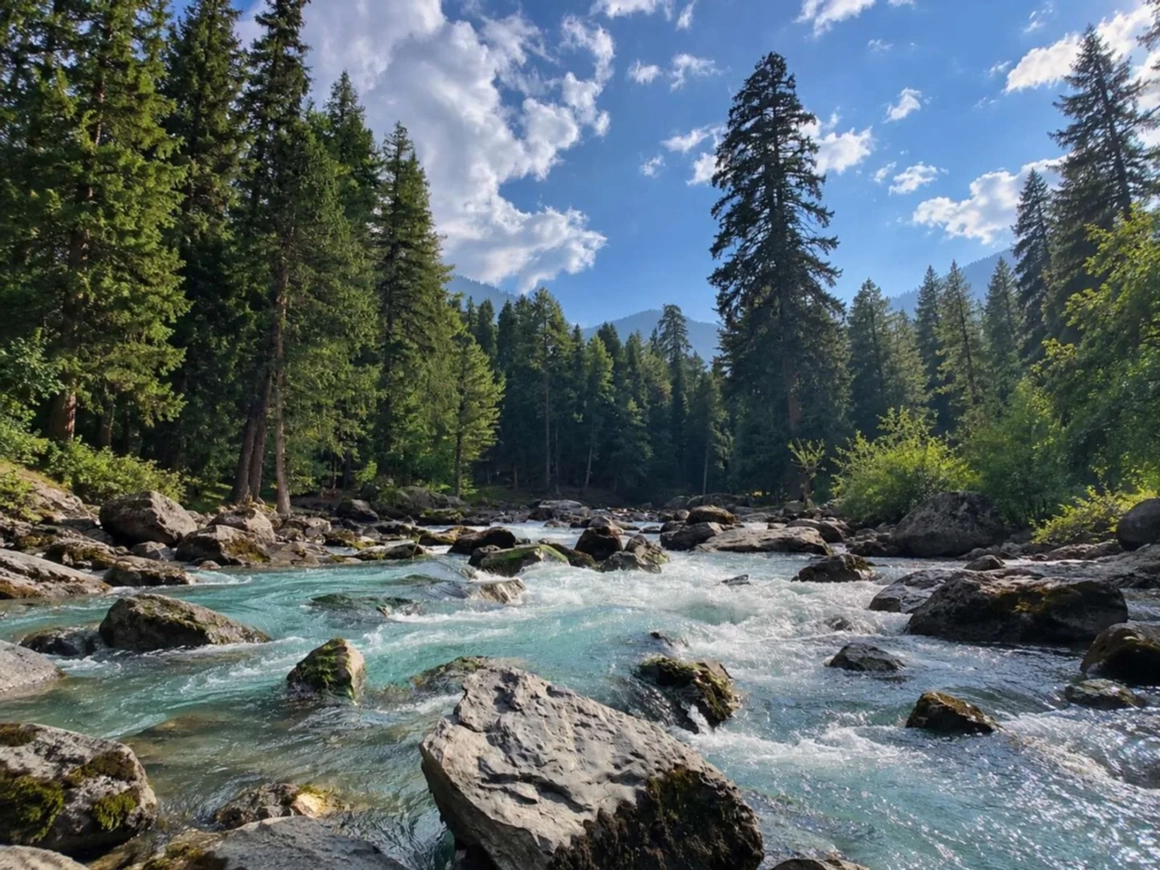The same river with a natural blue sky, green pines and clear water — after color correction The same river with a natural blue sky, green pines and clear water — after color correction