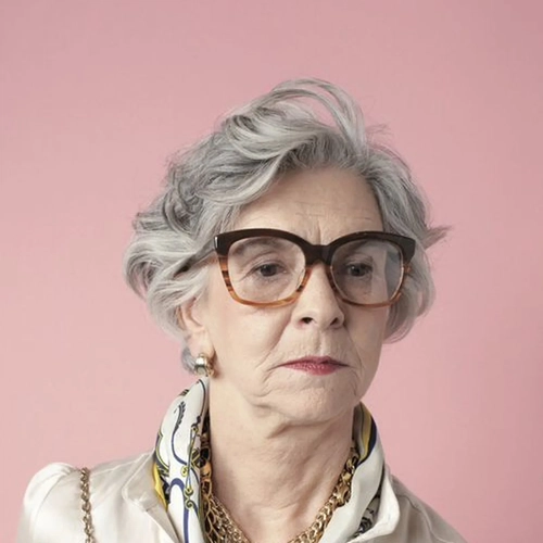Portrait with thick dark glasses, ready to pick Glasses as the item to remove
