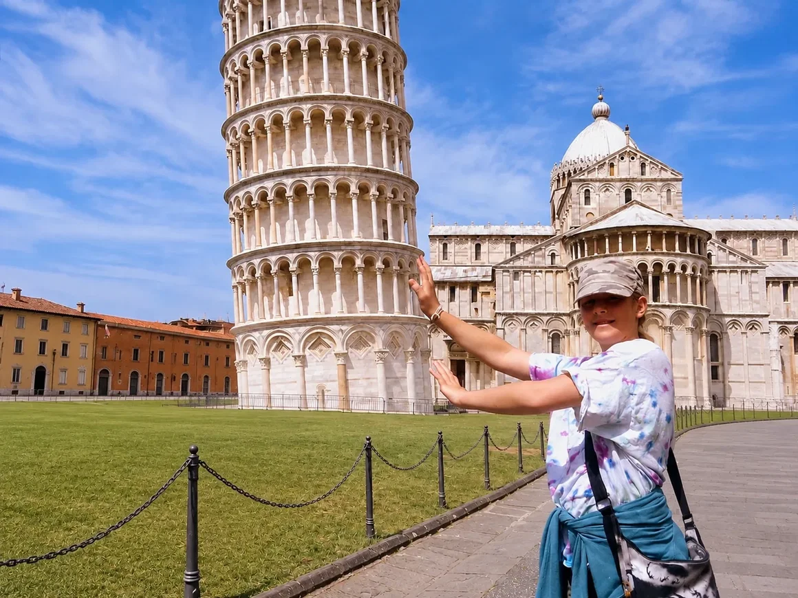 The same Pisa photo with every tourist removed and the lawn, path and cathedral rebuilt The same Pisa photo with every tourist removed and the lawn, path and cathedral rebuilt